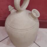 Old terracotta gargoulette jug