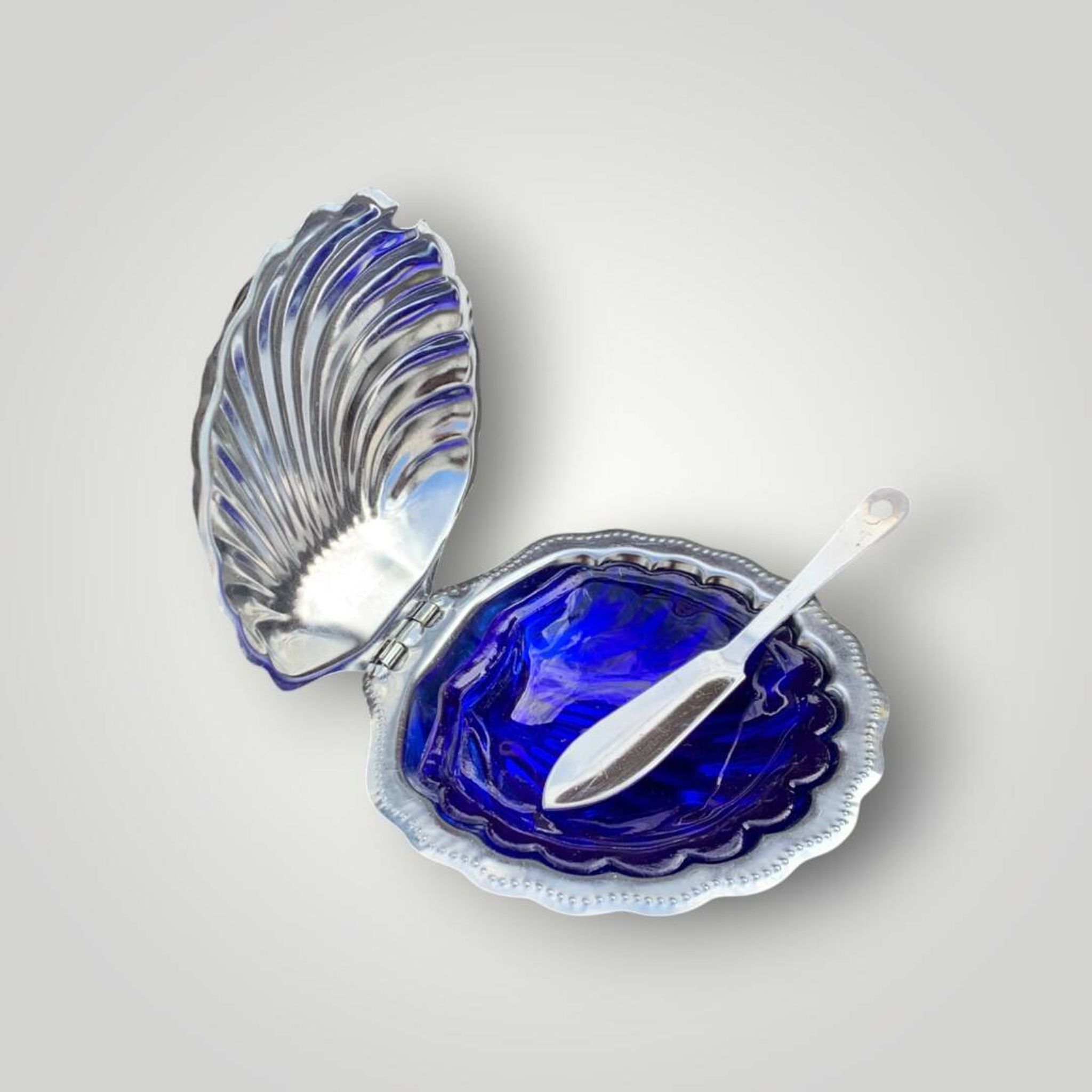 Vintage shell butter dish in stainless steel and cobalt blue glass with knife