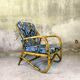 Fauteuil vintage en rotin et tissu à fleurs