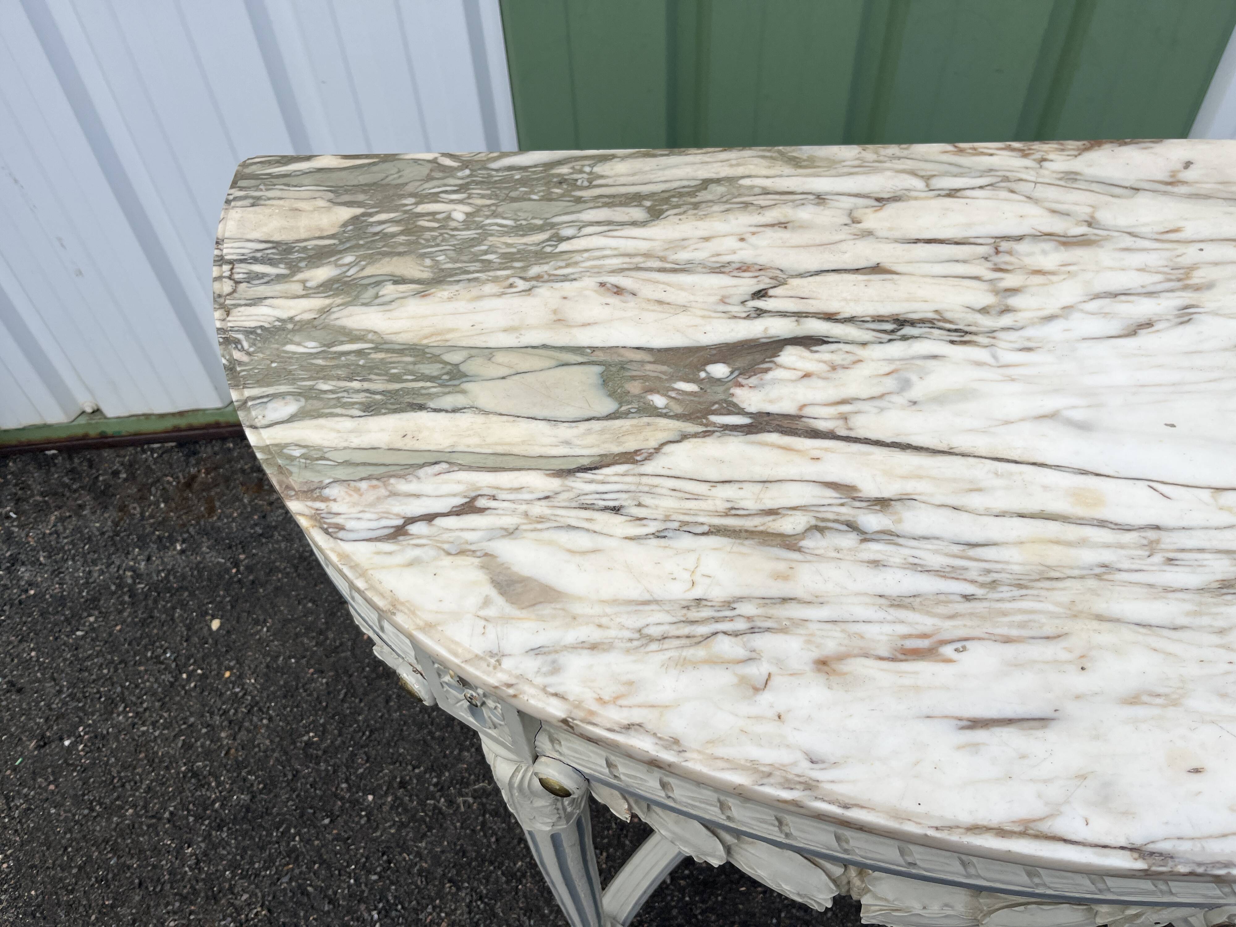 Louis XVI style half-moon console table with carved and painted wood and marble top