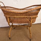 Rattan cradle on wheels