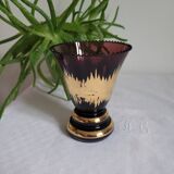 Flared vase in purple glass with a central gold motif