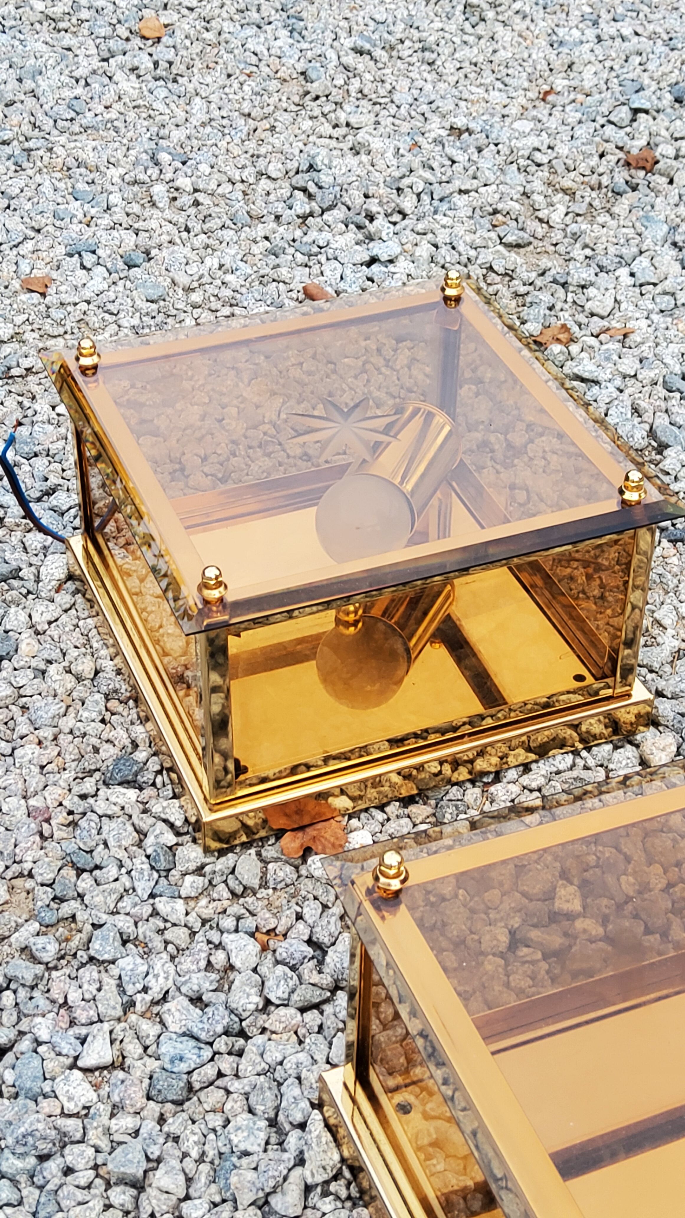 Pair of wall lamps in smoked glass and gilded metal from the 70s/80s