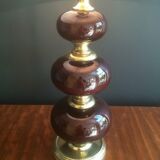 Lamp made of brass and red colored glass