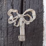 Patinated linen hook