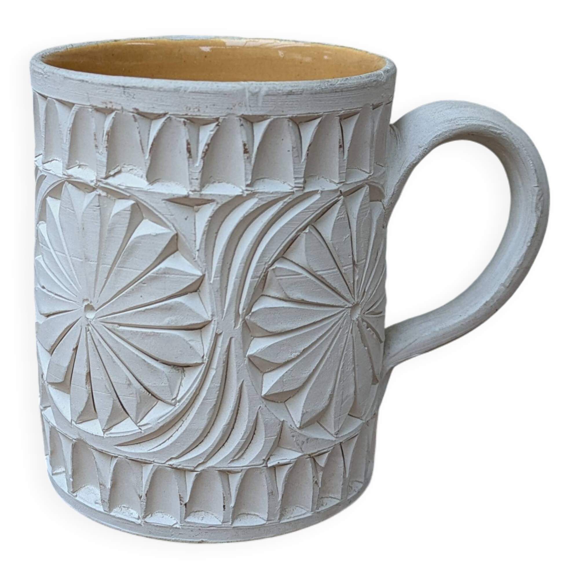 Old terracotta mug with glazed interior