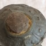 Old child's toy. Horse with bronze wheels. Ethnic object.