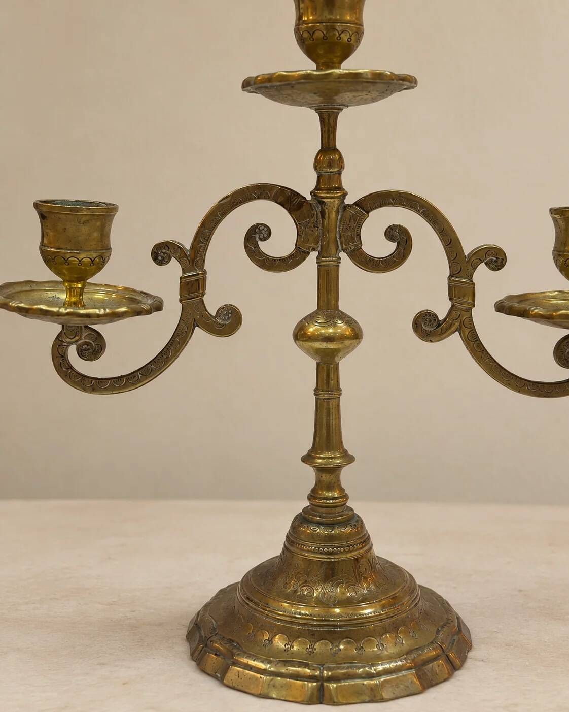 Three-light candelabrum in engraved brass — France, circa 1900