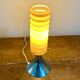 Vintage orange lamp with chrome tulip base and glass shade