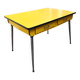Table in bright yellow formica from the 70s.