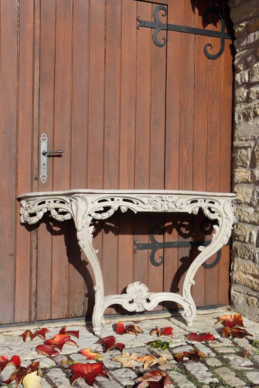 Carved wooden console