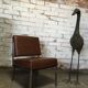 Modernist fireside chair / vintage chrome and skai armchair