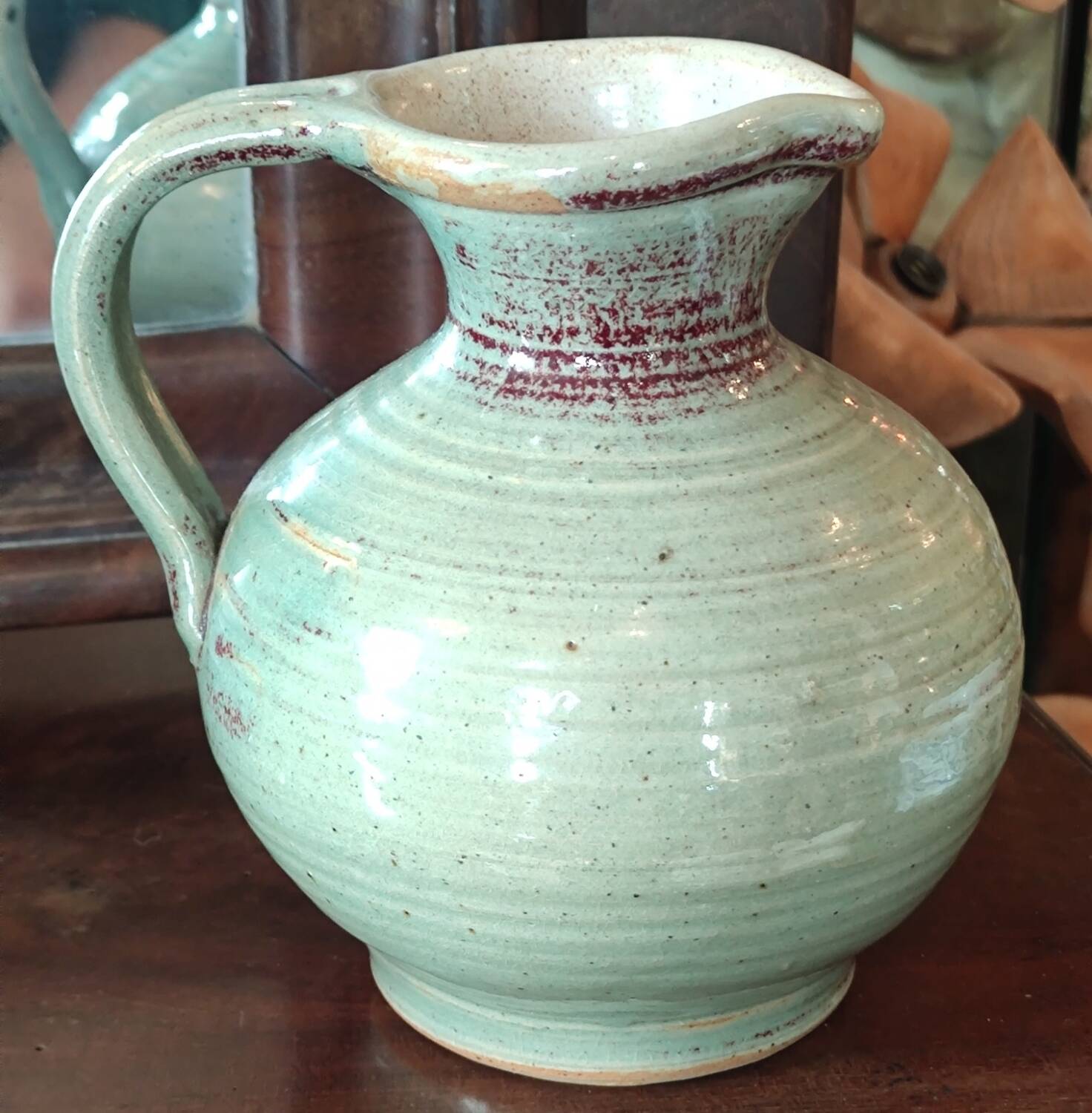 Old small glazed ceramic pottery pitcher