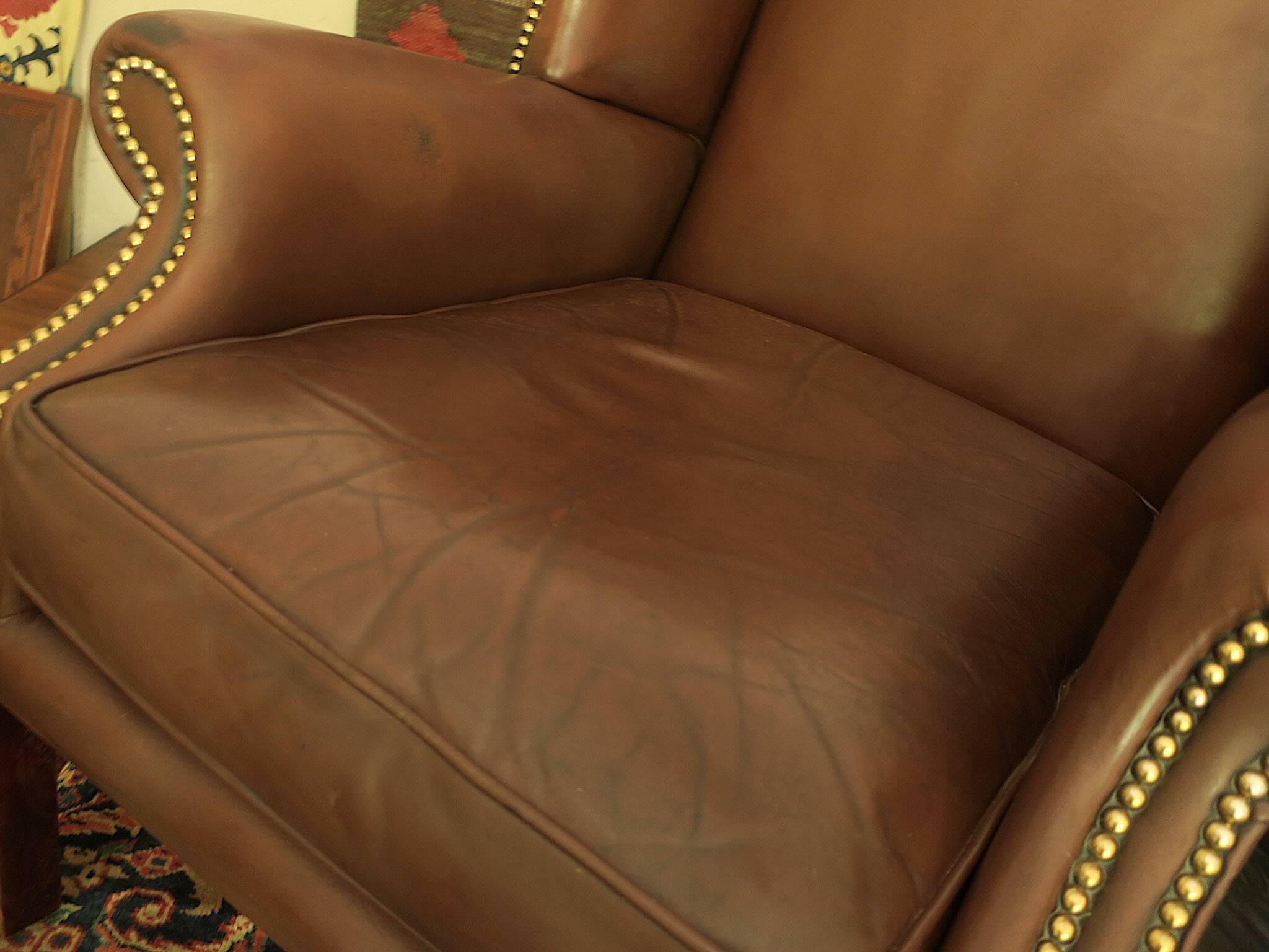 Vintage wingback lounge chair in brown leather, 1970s