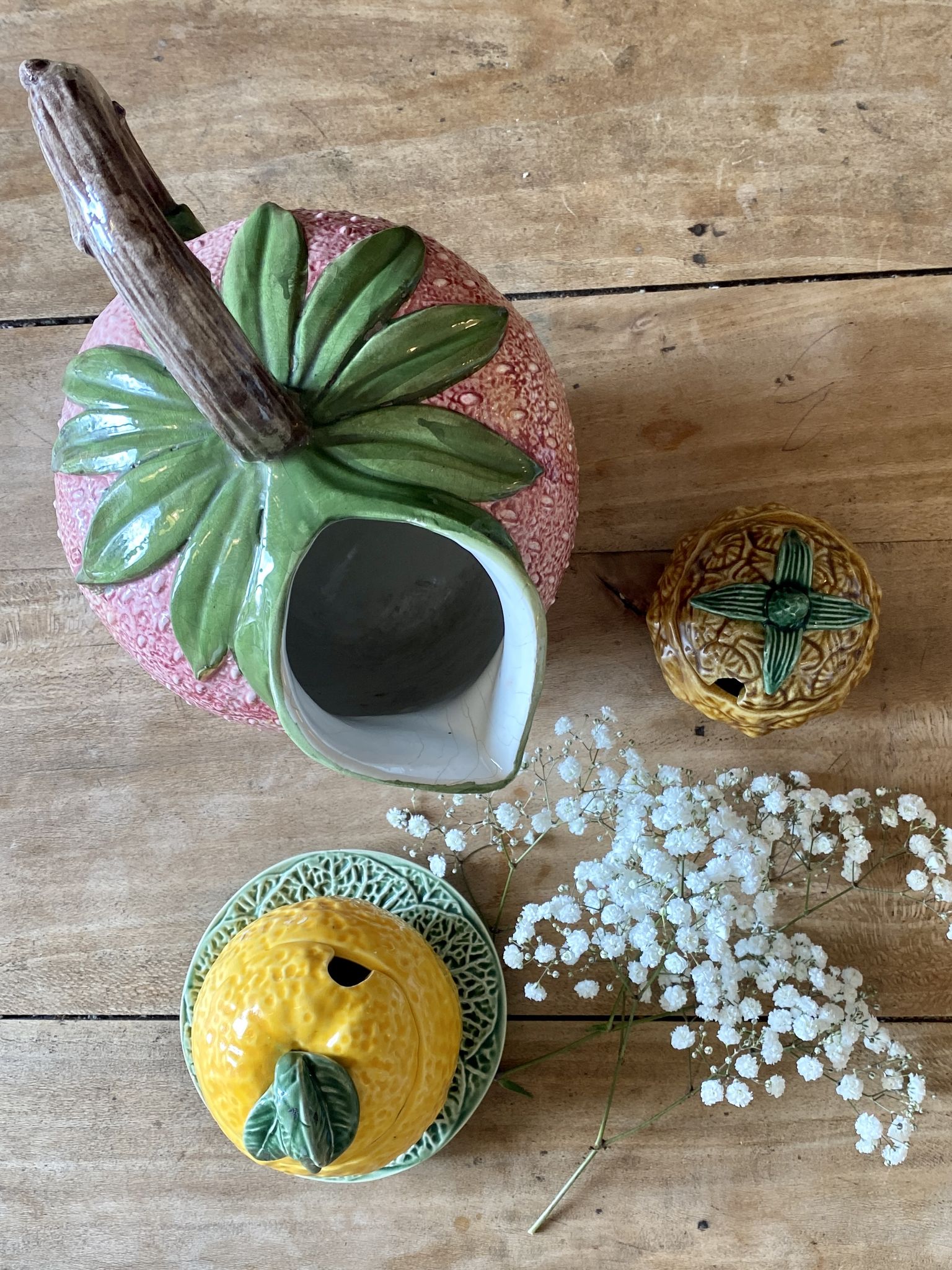 Set of ceramic fruits, a strawberry decanter and two lemon and pineapple jam jars