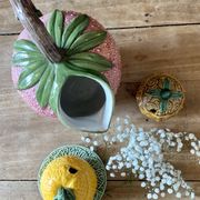 Set of ceramic fruits, a strawberry decanter and two lemon and pineapple jam jars