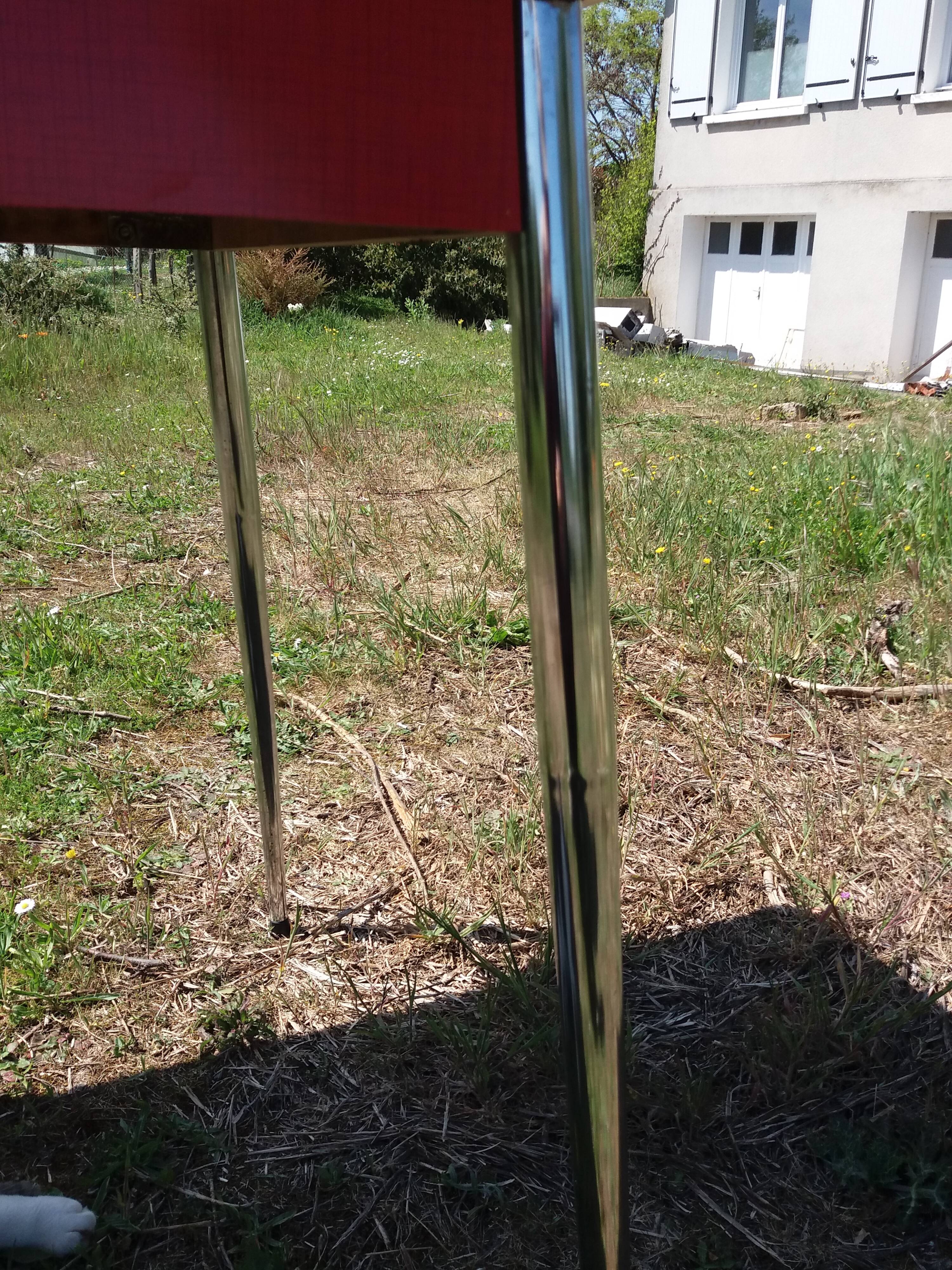 Dining table with red formica extensions
