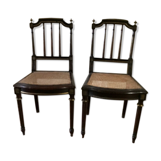 Pair of Napoleon III chairs in mahogany golden brass fillets
