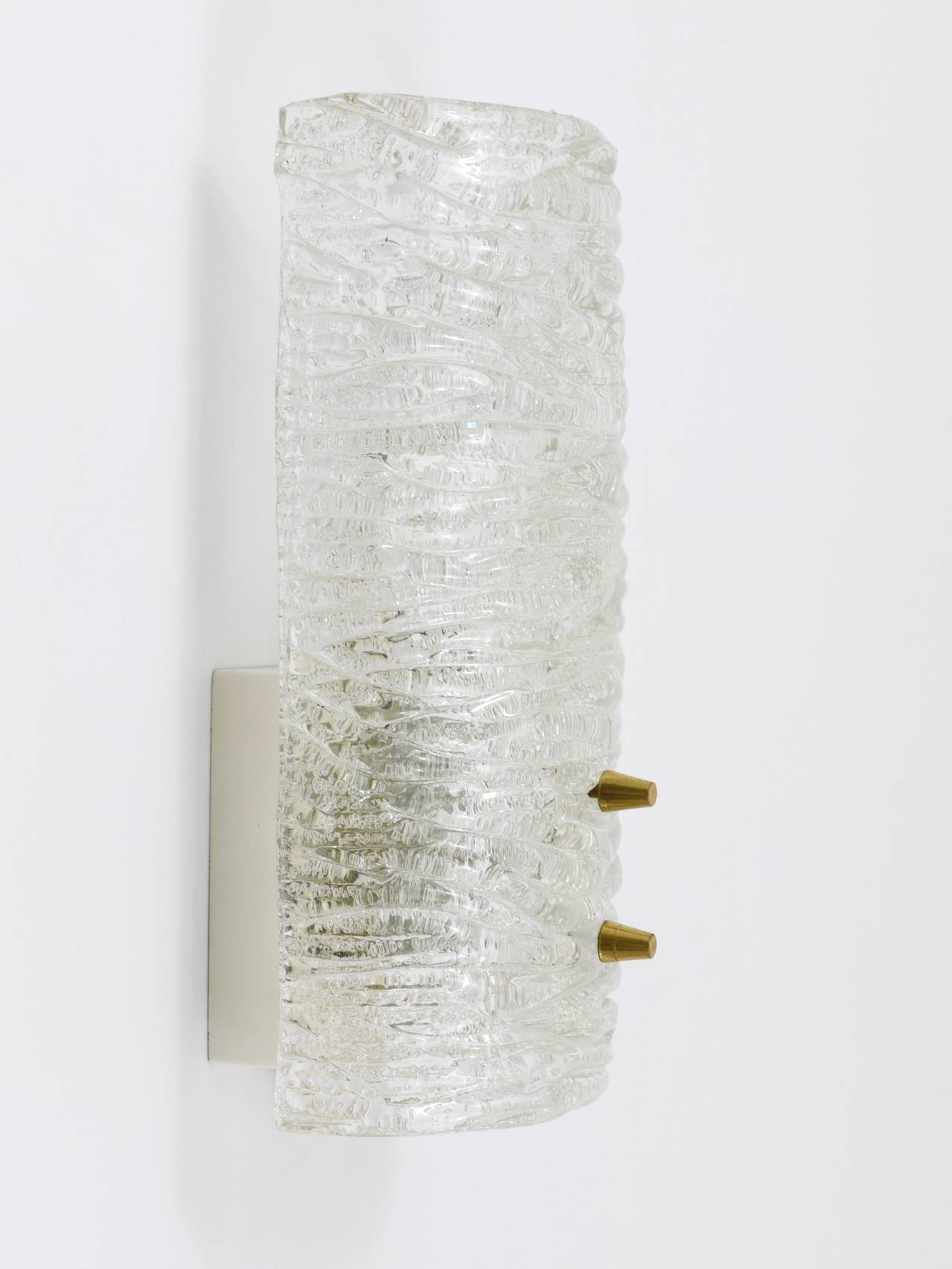 Pair of wall sconces by J.T. Kalmar, brass and textured glass, Austria, 1950s.