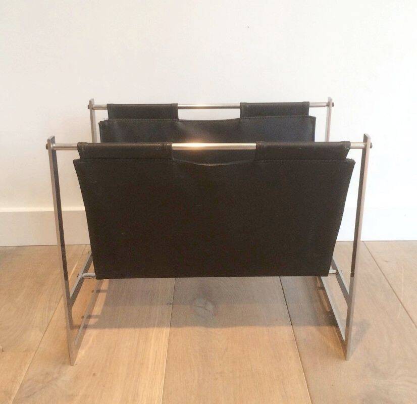 Magazine rack in brushed steel and leather, in the style of Poul Kjaerholm