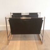 Magazine rack in brushed steel and leather, in the style of Poul Kjaerholm