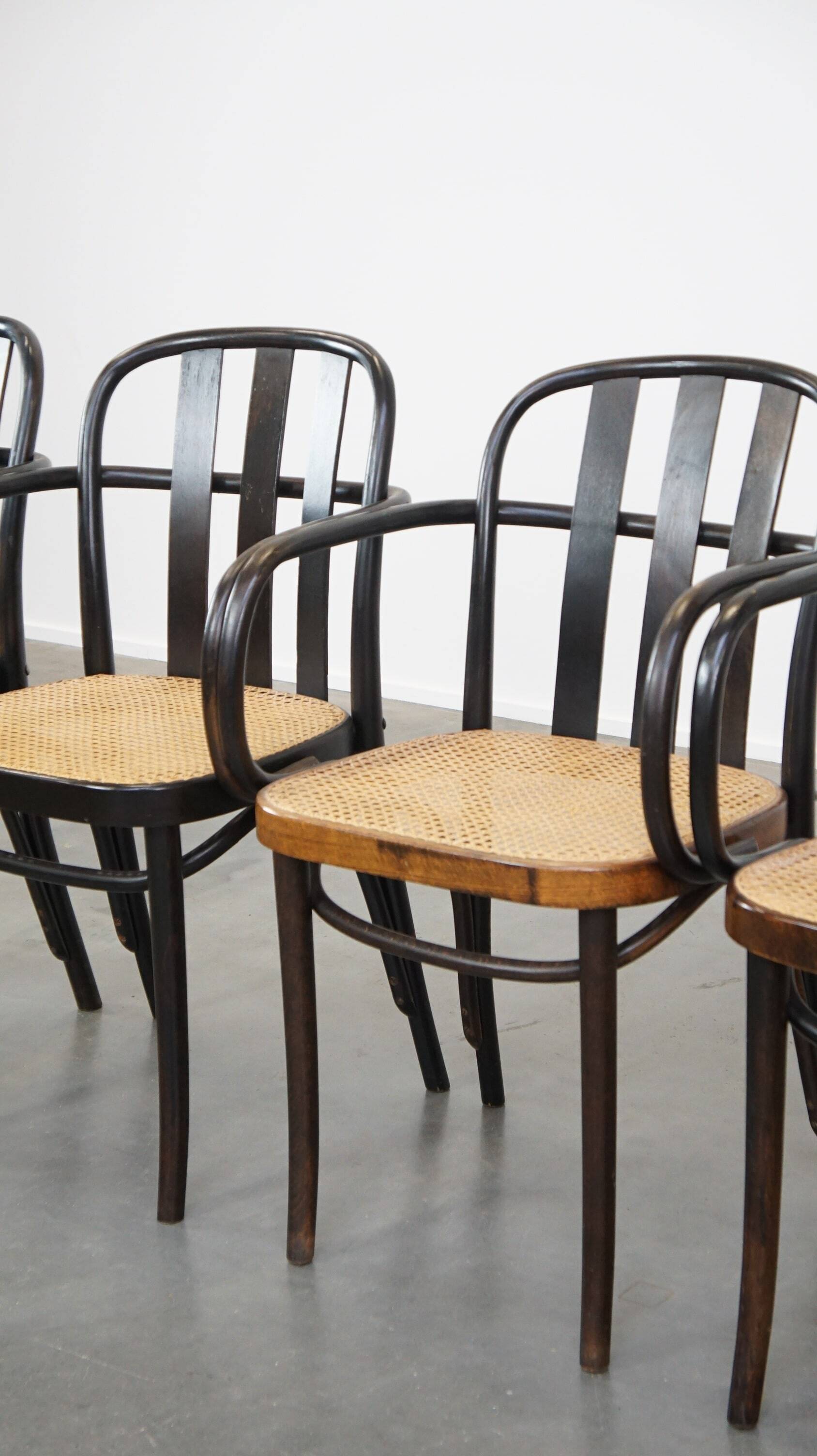 Set of 4 vintage wooden design dining/bistro chairs with woven seats