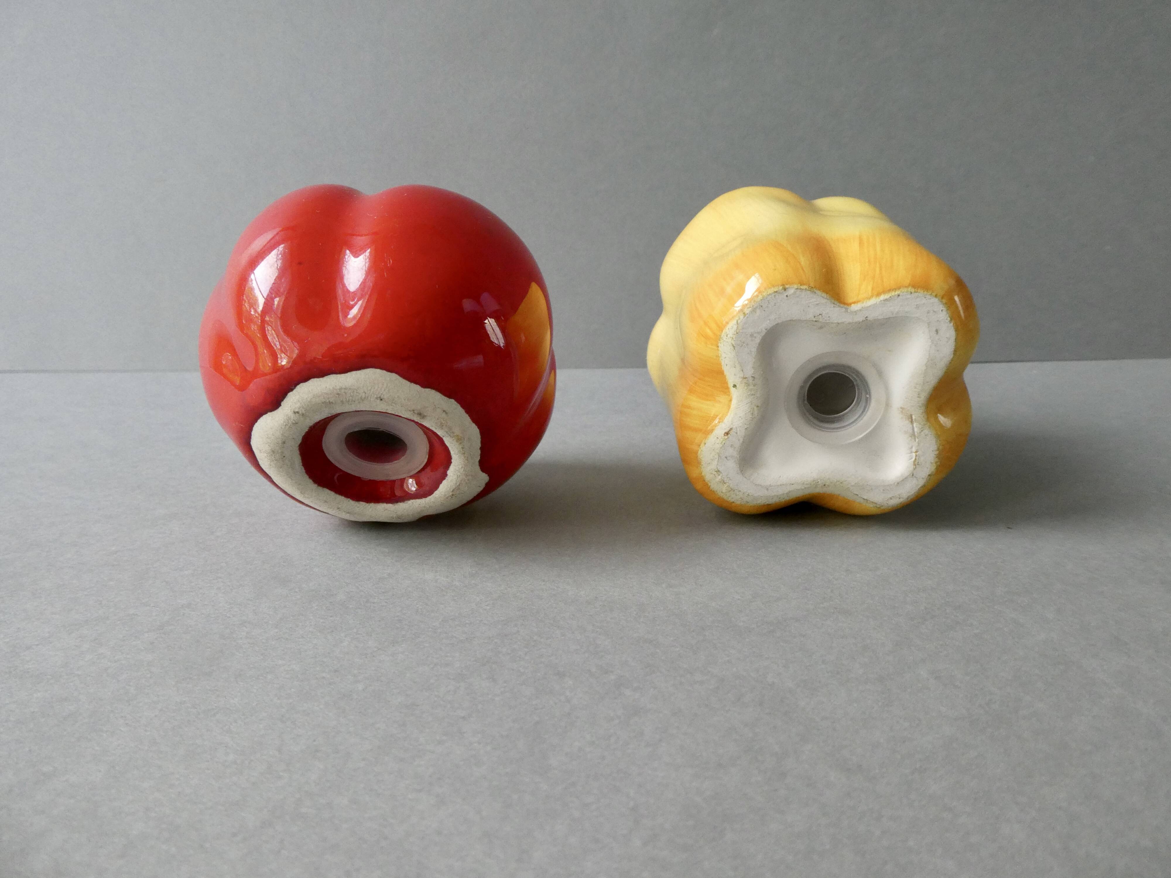Salt and pepper shakers in barbotine, pepper and tomato shape