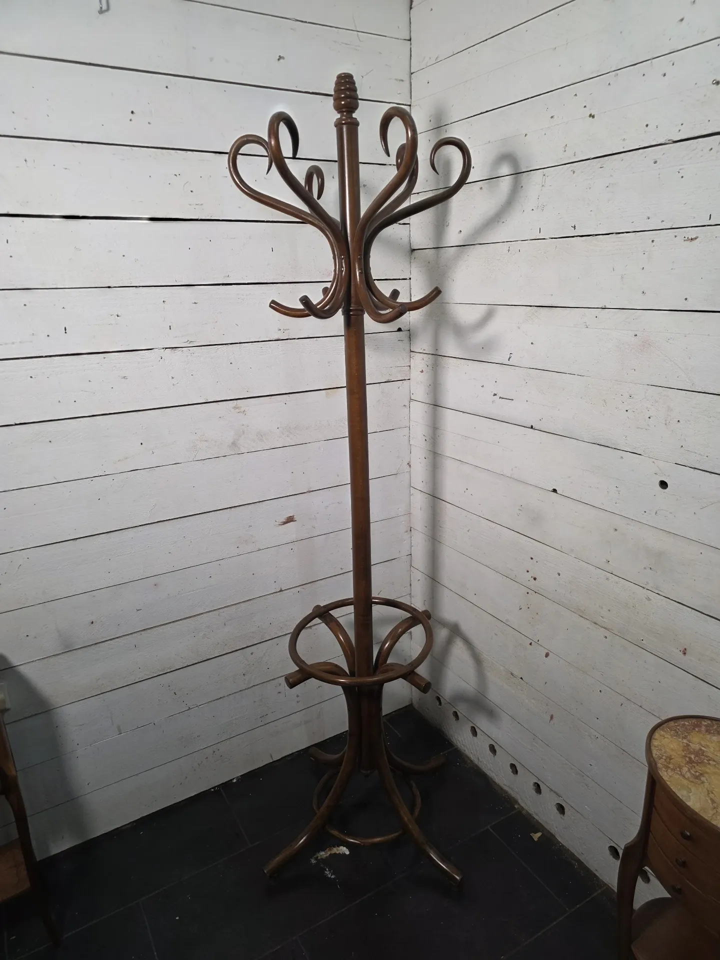 Curved antique wooden parrot