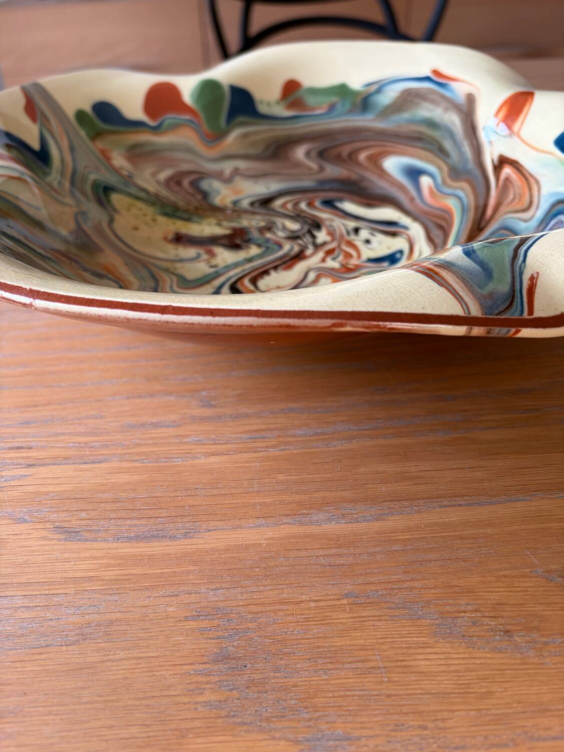 Glazed ceramic plate signed