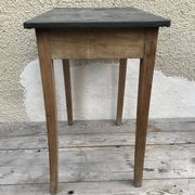 Old kitchen table in wood with compass feet