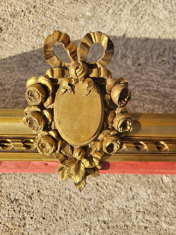 Old bed canopy in yellow copper and bronze