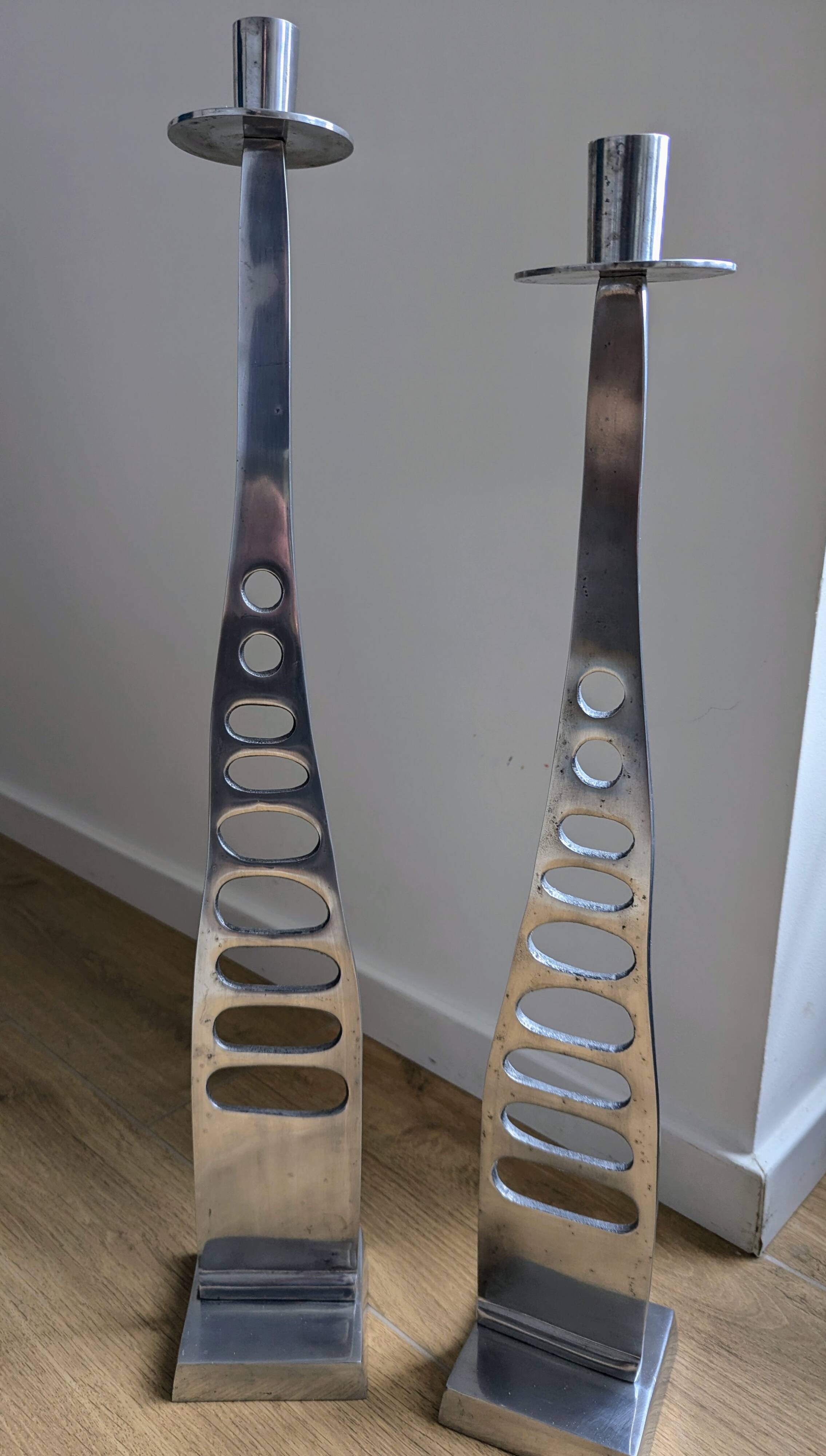 Very beautiful pair of large candlesticks on designer metal bases