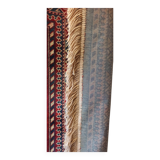 Wall rug with oriental patterns.