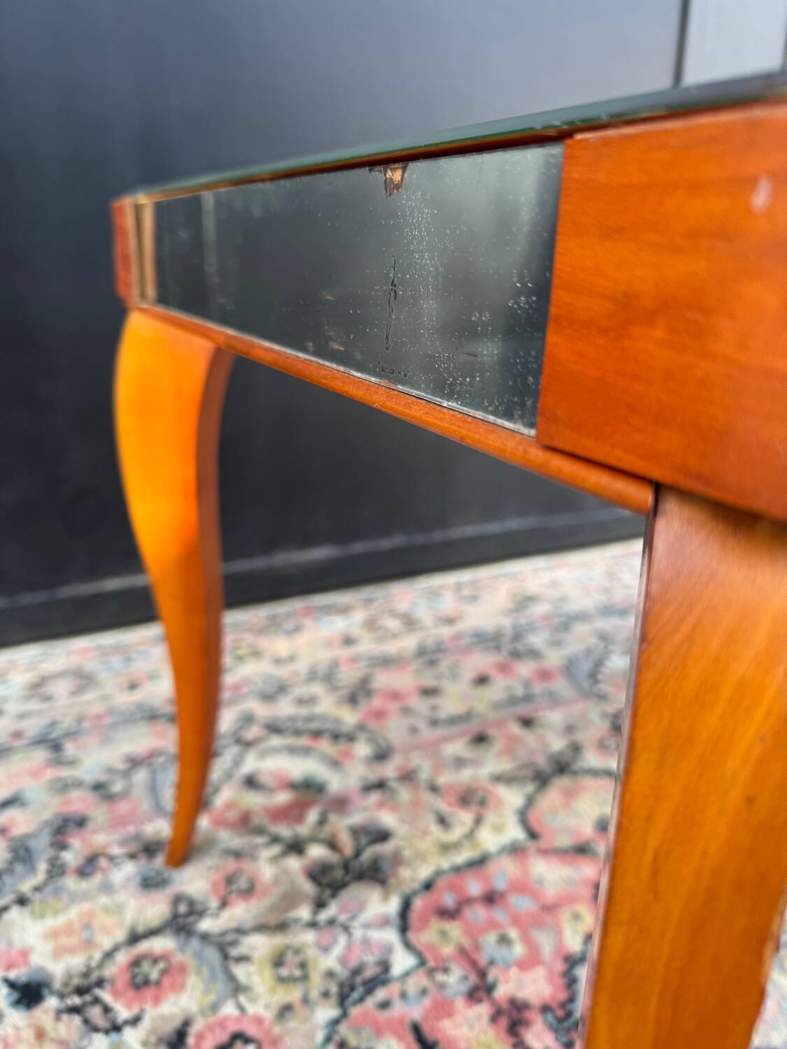 Small wooden coffee table with a mirror from the 1950s.