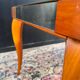 Small wooden coffee table with a mirror from the 1950s.