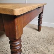Wooden coffee table with turned legs