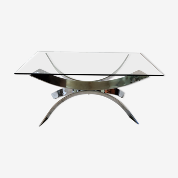 A chrome-shaped table and a 70s glass tray