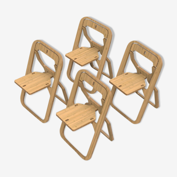 Set of 4 Infine folding chairs by Christian Desile