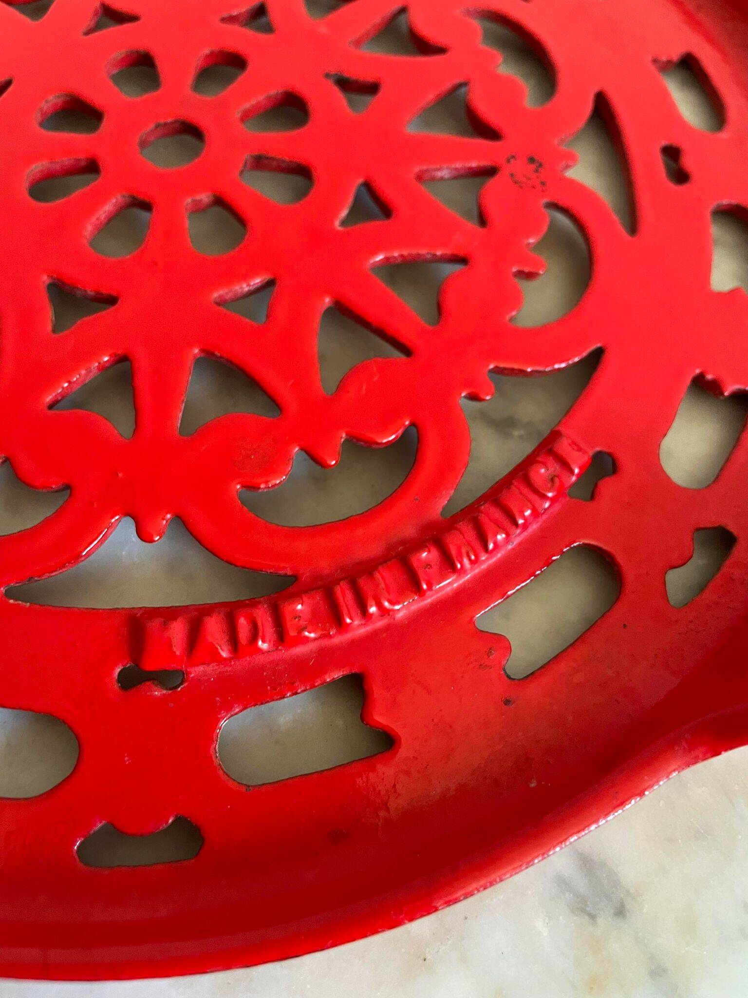 Vintage red Decotec enameled cast iron trivet