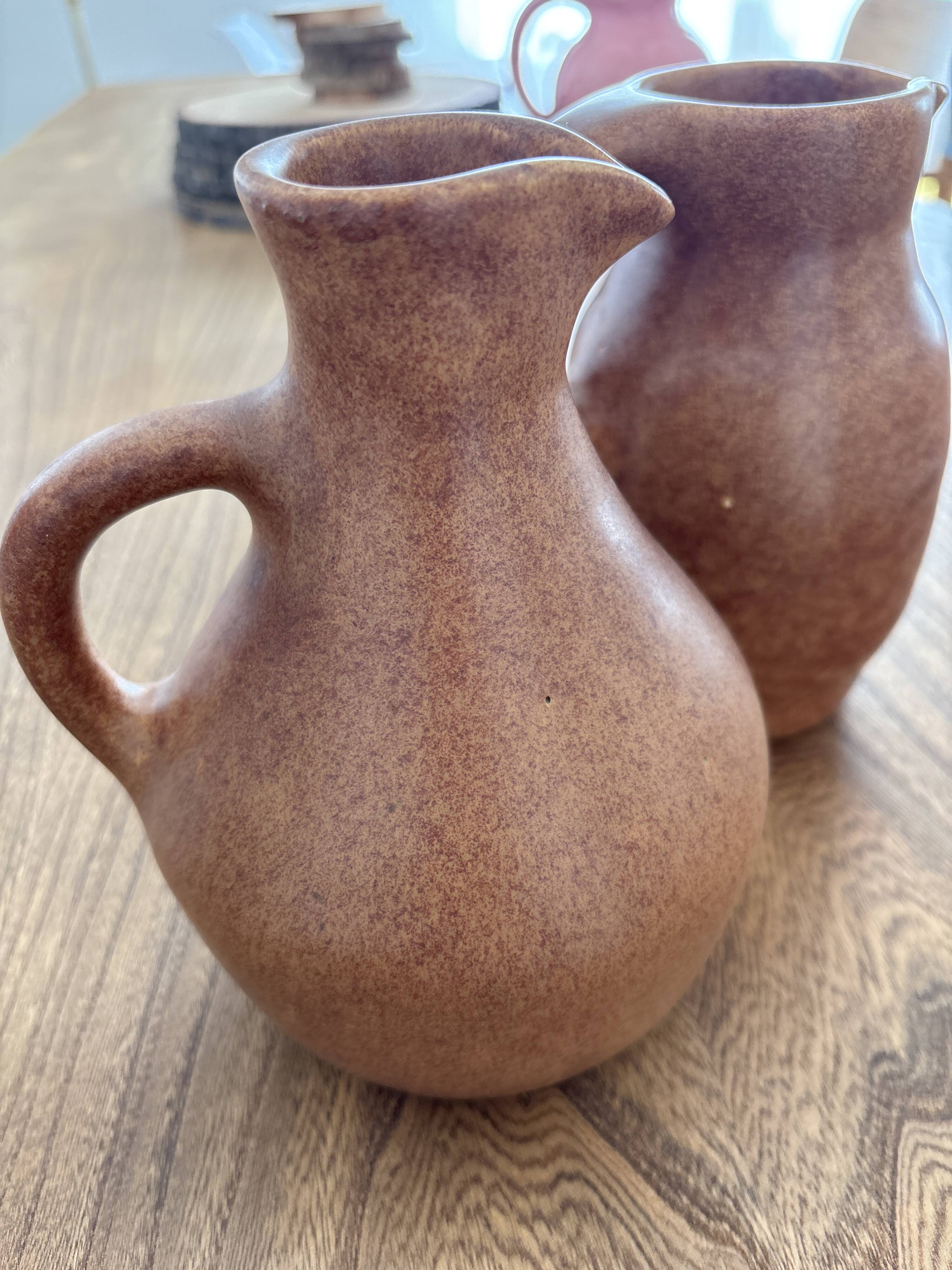 Vintage brown ceramic pitcher signed Max Idlas.