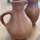 Vintage brown ceramic pitcher signed Max Idlas.