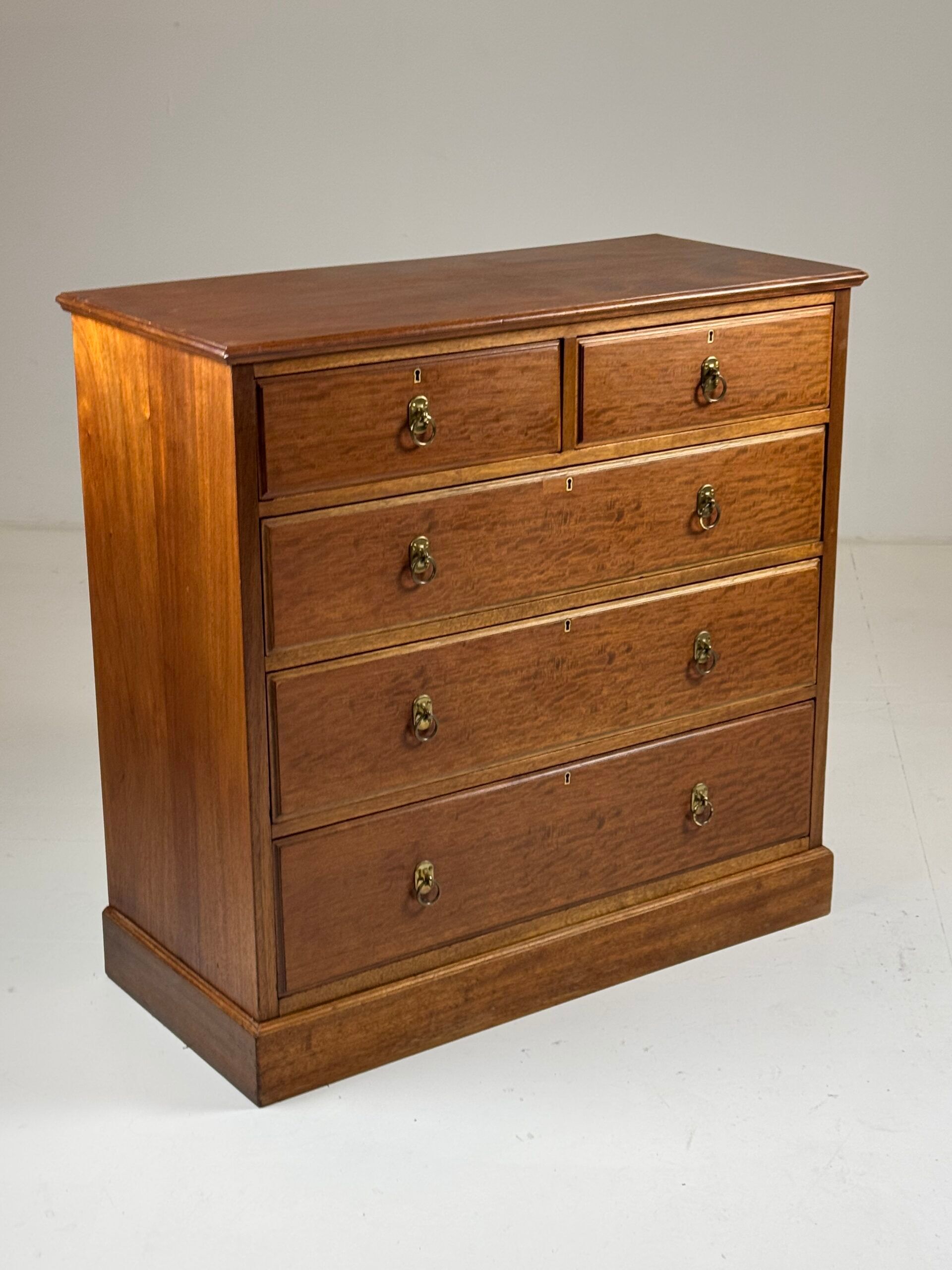 Harrods mahogany chest of drawers