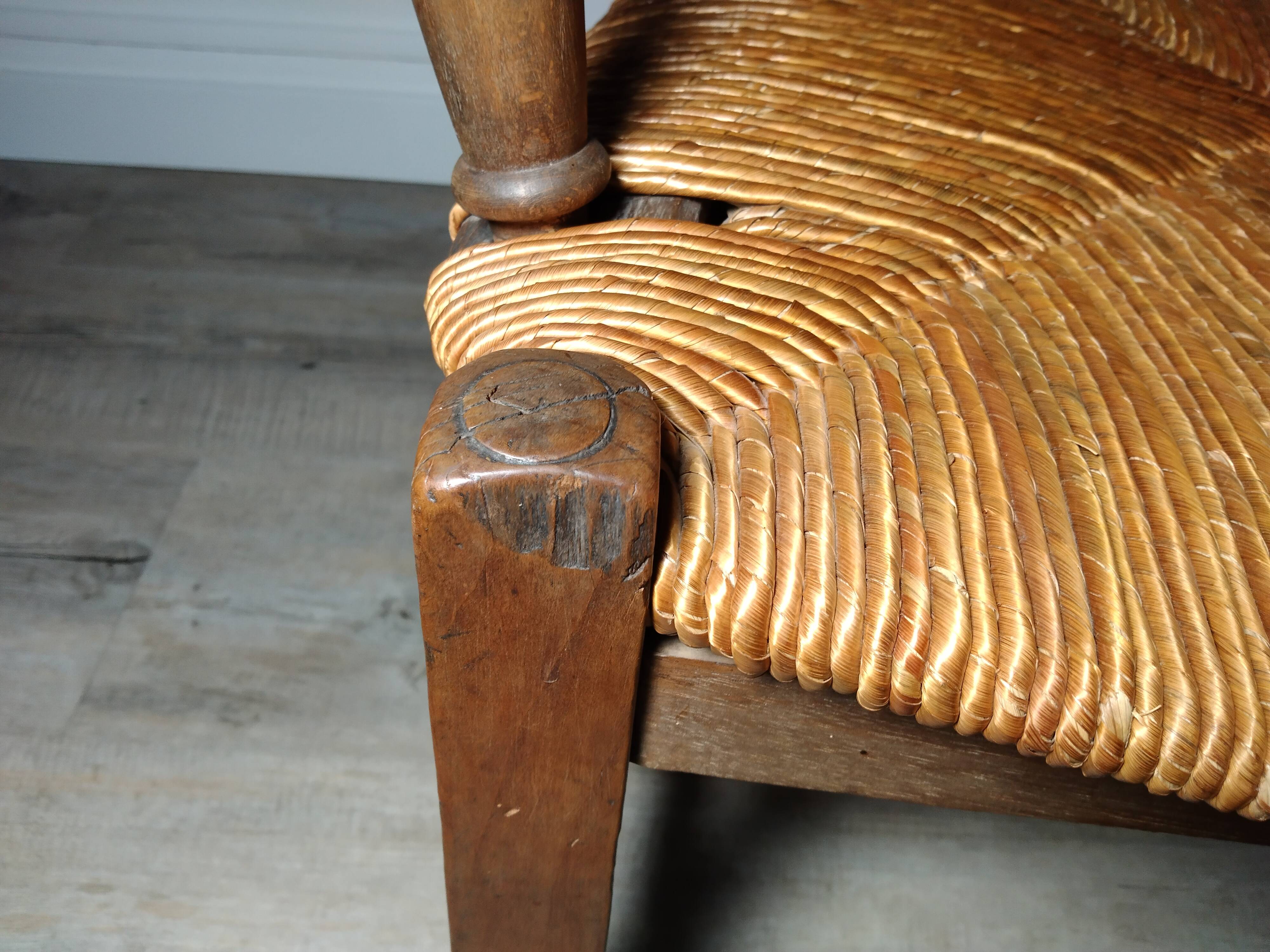 Straw armchair folk art.