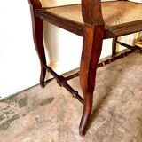 Dark wood and cane bench