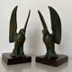 Pair of eagle bookends in green patina regula with rosewood base