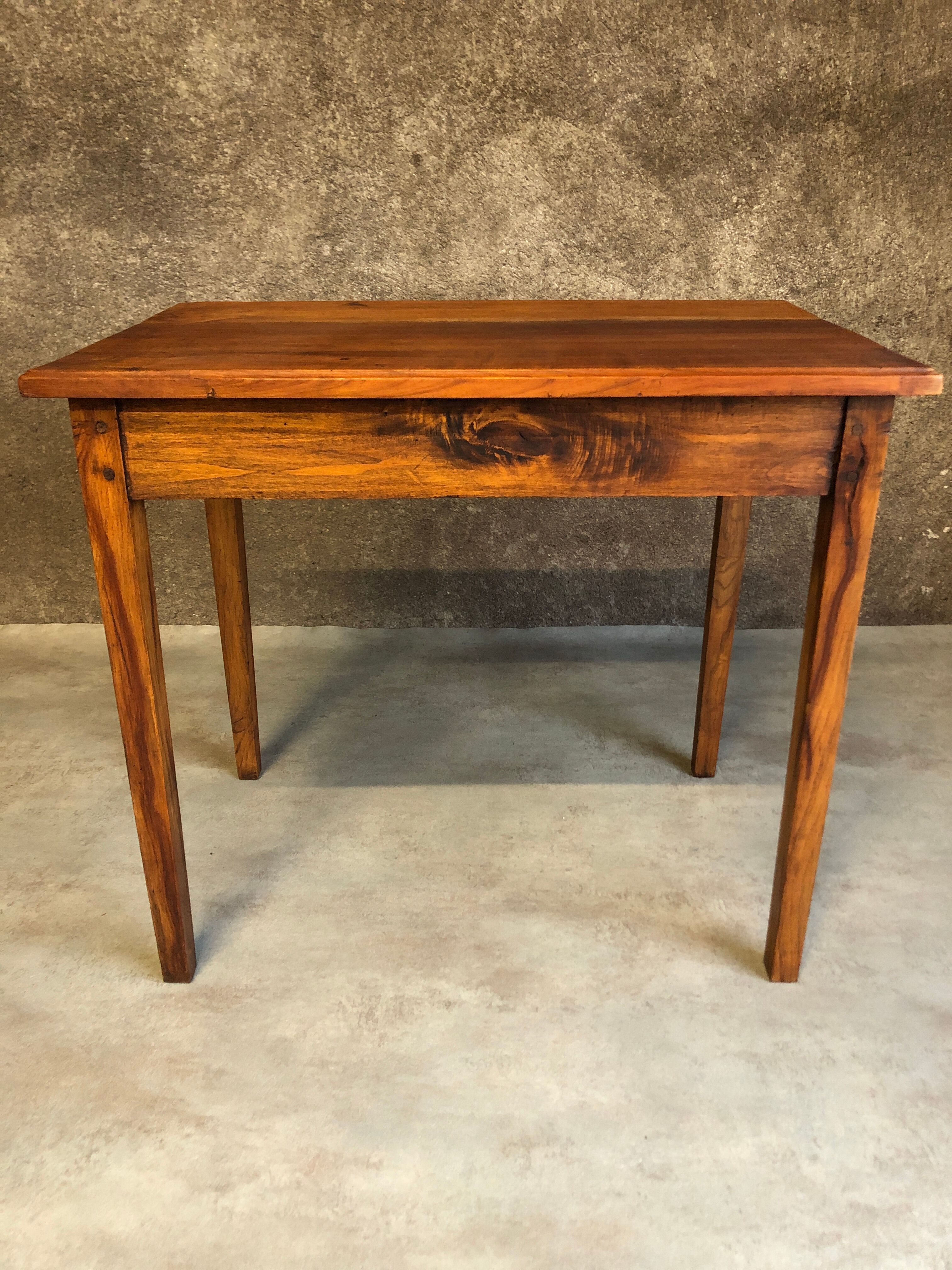 Walnut wood desk with a drawer