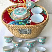Chinese porcelain tea service with wicker basket