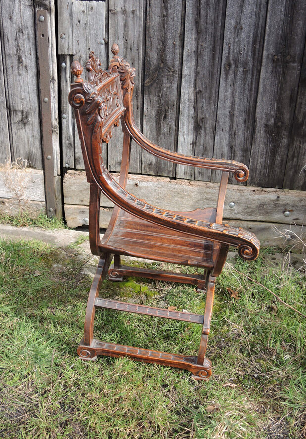 Former curulle chair says dagobert carved wood