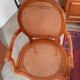 Antique Louis XVI style cane armchair
