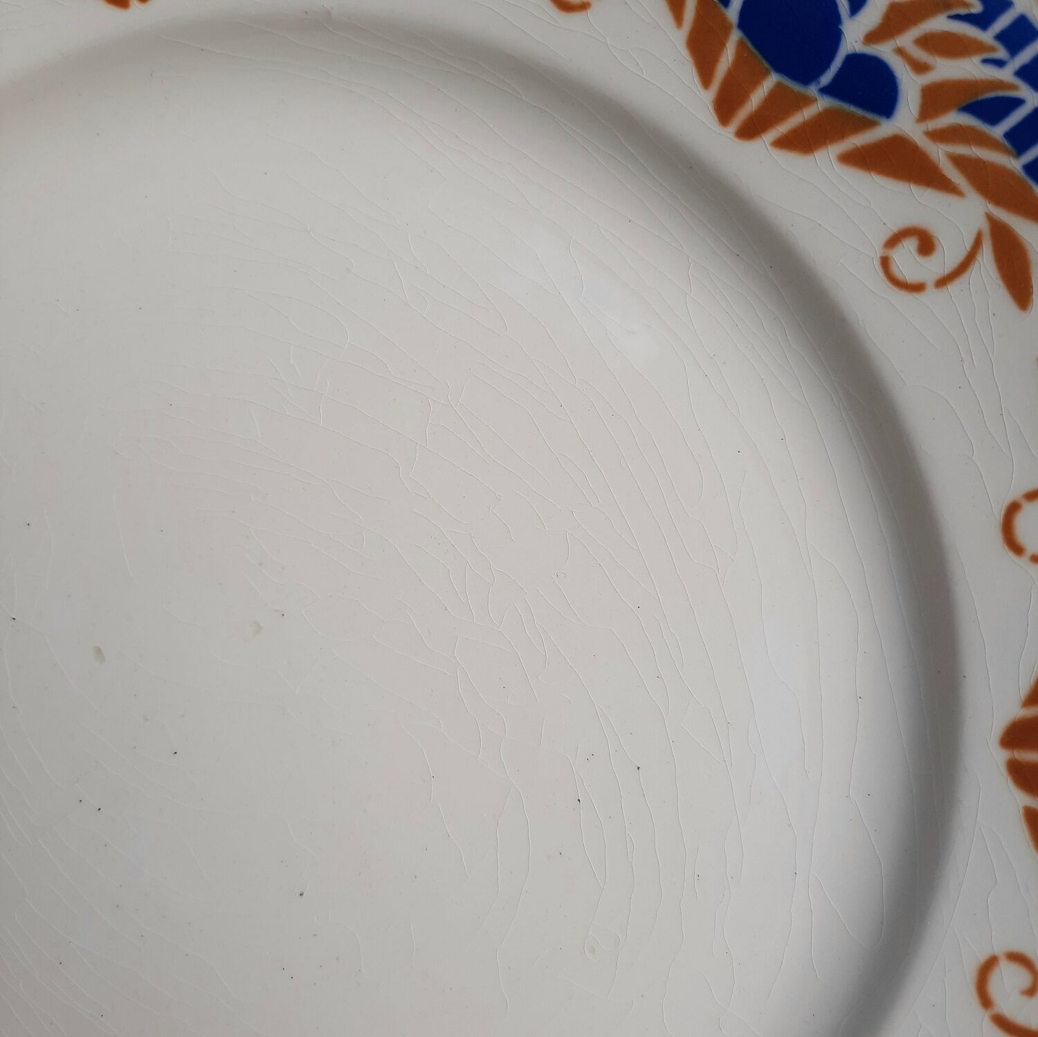 Old flat plates mismatched in earthenware